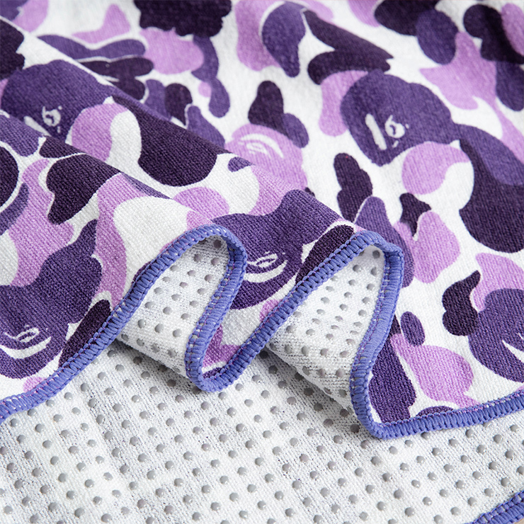 What are the features of the PVC Plum Yoga Towel?